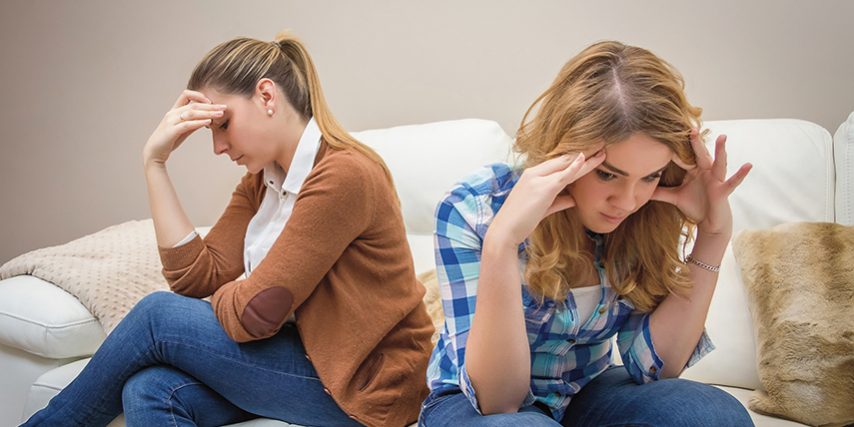 Furious mother arguing with her teenage daughter